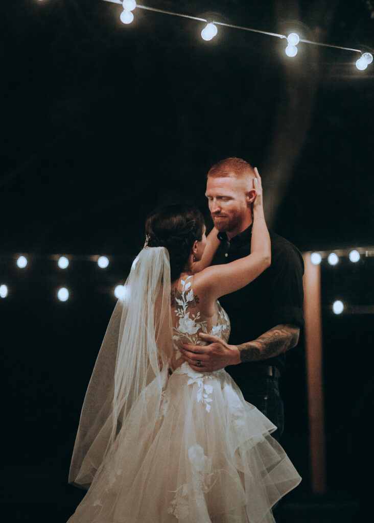 Couple Dancing During Evening Wedding | Plan a Successful Outdoor Wedding in Utah | Mill Pond Farms | Outdoor Wedding Venue in Utah | Rustic Outdoor Wedding Reception in Utah