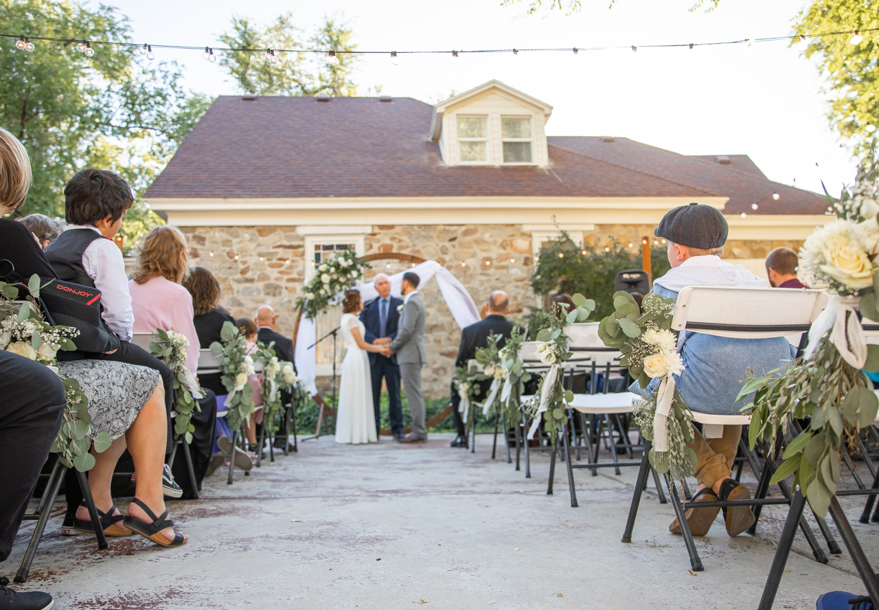 Outdoor Wedding Ceremony with a Focus on Guests | Why Choosing a Wedding Venue with an Indoor & Outdoor Area Is Essential | Mill Pond Farms | Outdoor Wedding Venues in Utah