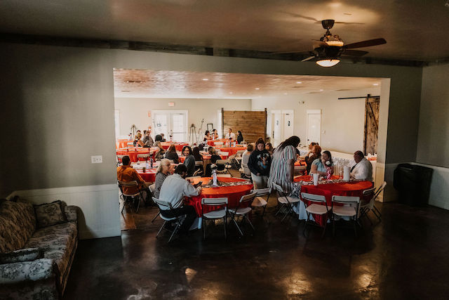 Ten Red Circle Tables with Guest Chatting | Mill Pond Farms Events Venue for Small Gatherings | Host Business & Family Events